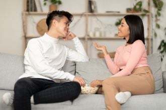 couple talking and smilling
