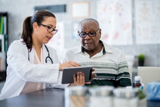Doctor with male patient