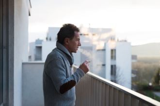 man smoking outside