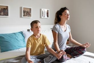 boy and woman yoga