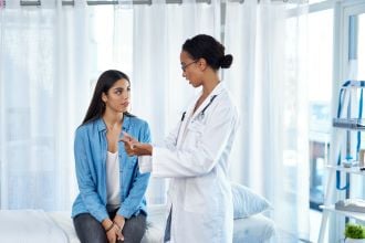 doctor explaining something to patient